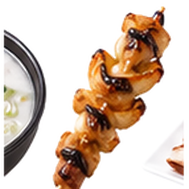Brocheta de pollo con salsa